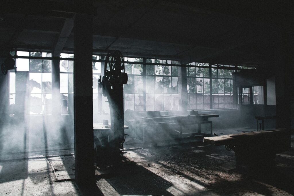 a room with windows and a fire in it